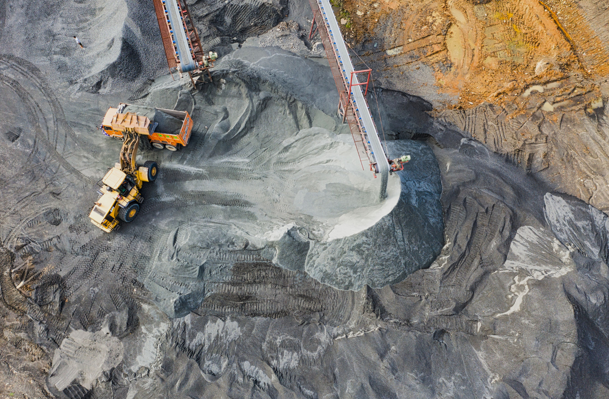 Aerial view of active mine site operations leveraging resources sector skilled migration